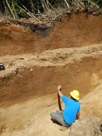 Richard Briggs, USGS, Takes a Close Up Look at the Wall of the Sackungen in the Trench