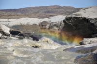 Milky meltwater river from Leverett Glacier Greenland