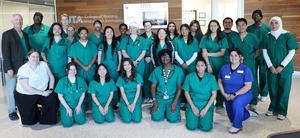 Students in UTA's SCIE 4304 class with instructor Dr. Steven Gellman, standing at left; Chloe Bennett, experiential learning librarian, front left; and Erica Hinojosa, simulation technology manager, front right.