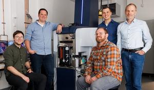 The research team with the modified fluorescence microscopy–t-MALDI-2 mass spectrometer