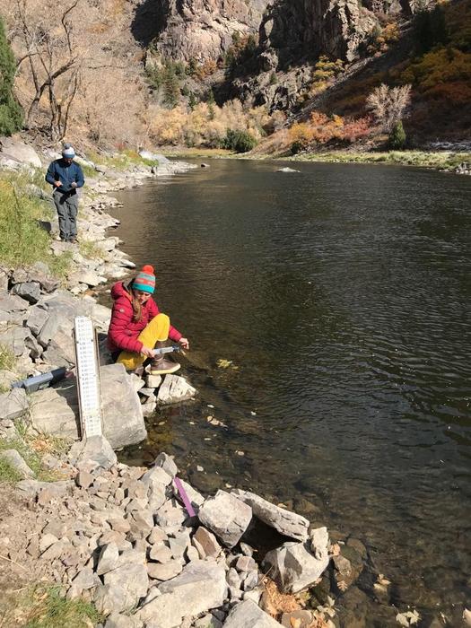 Taylor Maavara (front) samples the Gunnison River in Gunnison National Park, Colorado.