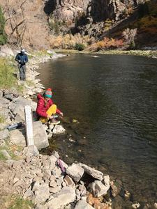 Taylor Maavara (front) samples the Gunnison River in Gunnison National Park, Colorado.