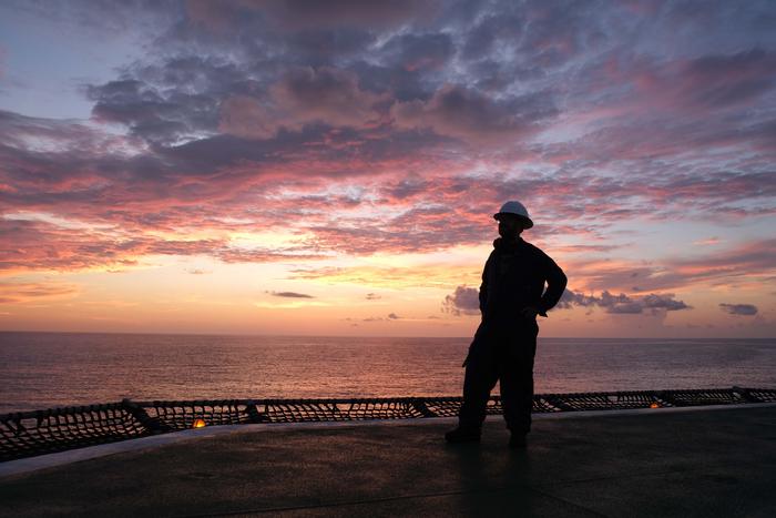 scientist at sunset