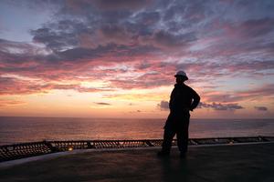 scientist at sunset