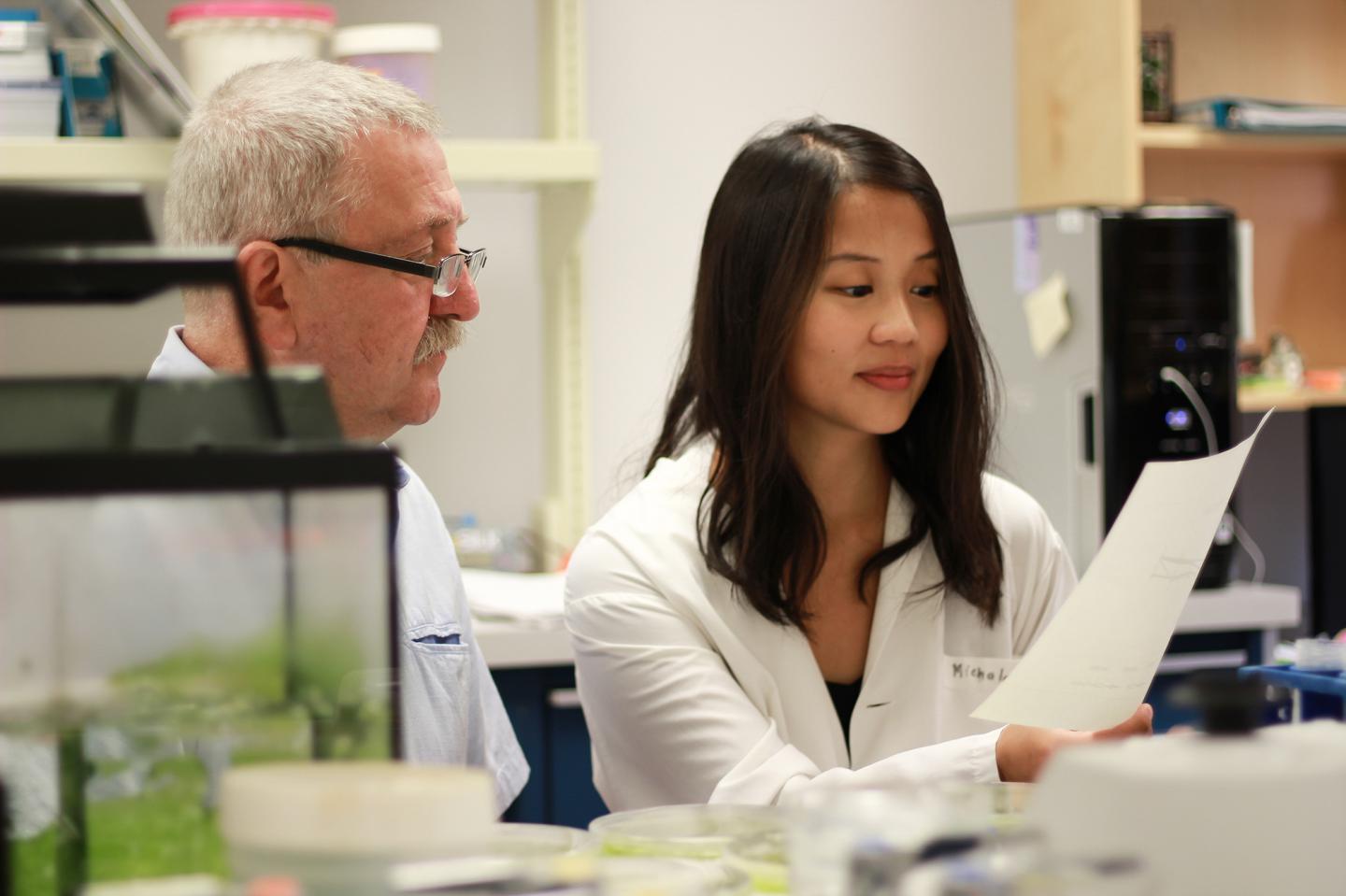 Marek Michalak and Wen-An Wang Working in the Lab