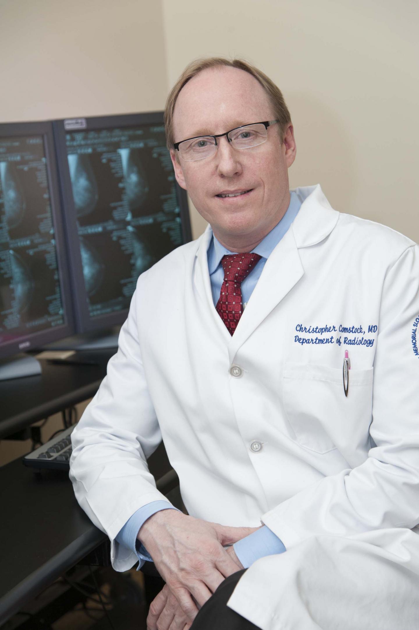 Christopher E. Comstock, MD