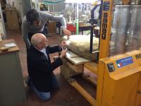 Scientists Examine Stele