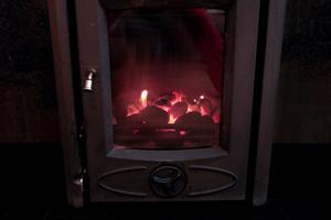 Uni-7370.jpg: Photo of domestic stove burning “low smoke” ovoid coal. Photo: Martina Regan
