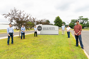 CFN staff outside the building