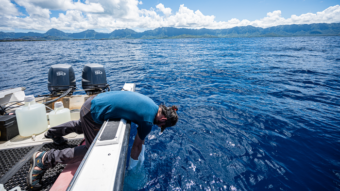 A. Murat Eren sampling for surface ocean microbes.