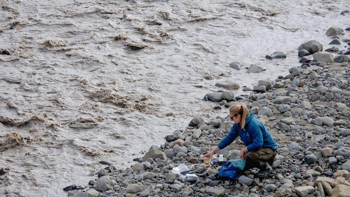 Dr Gabrielle Kleber taking Svalbard water samples
