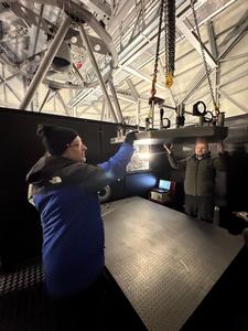 The PLACID team oversee the installation of the instrument.