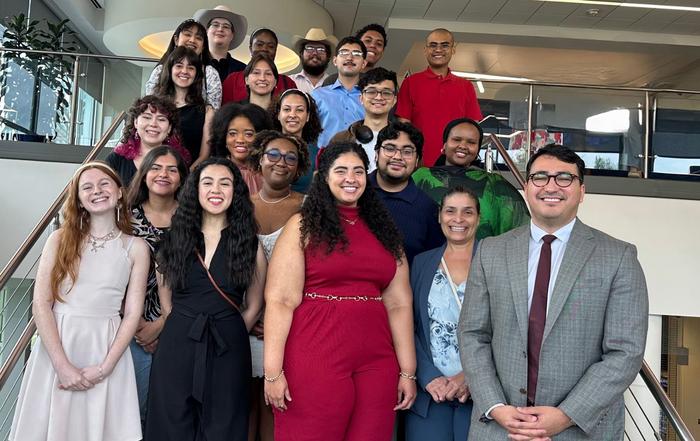 The 2025 University of Texas at Arlington McNair Scholars with director Ricardo Garza, right