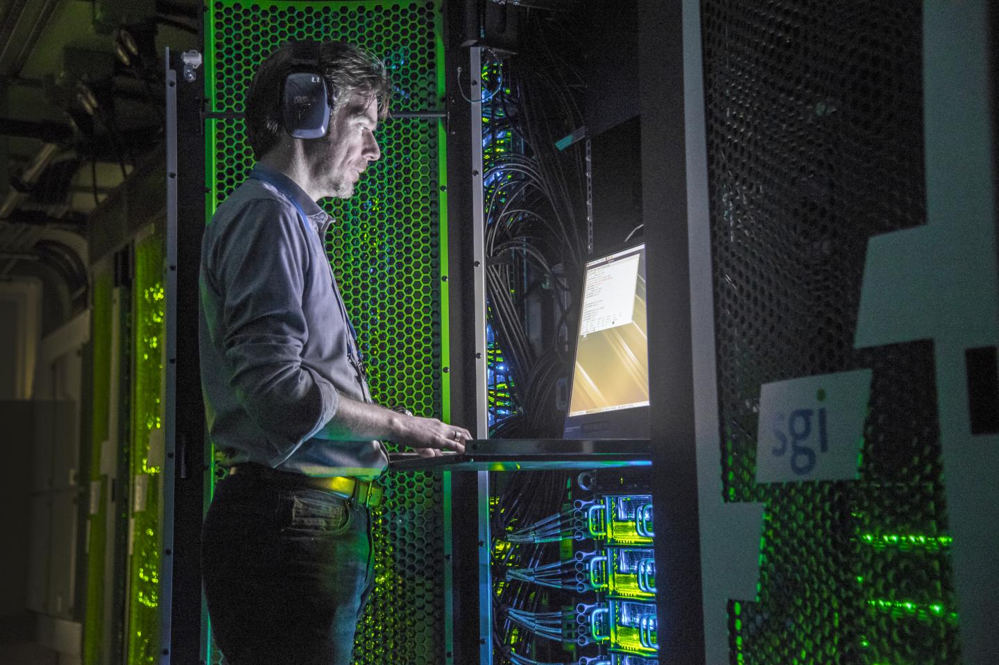 Dr. Tim Stitt in the Data Centre at Earlham Institute