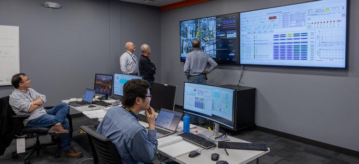 Scientists monitor operations in FLARE’s control room.