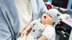 The doll used to develop the app is equipped with sensors that track/record the doll's posture