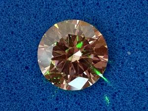 Diamond containing NV colour centres on a blue background (1)