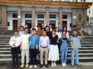 The attached picture mainly shows the nuclear physics team of University of South China led by Professor  Xiao-Hua Li.