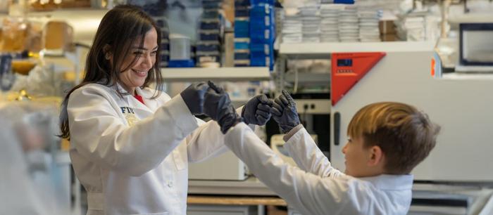 FIU Researcher Diana Azzam and Logan Jenner, a participant in her clinical study