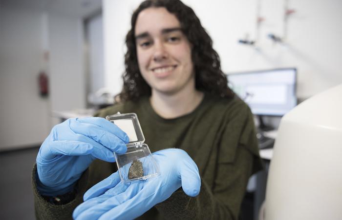 Leire Coloma, PhD Student at the EHU-University of the Basque Country showing extraterrestrial or meteorite samples