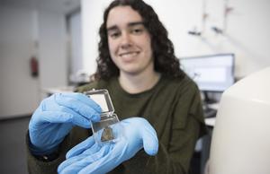 Leire Coloma, PhD Student at the EHU-University of the Basque Country showing extraterrestrial or meteorite samples