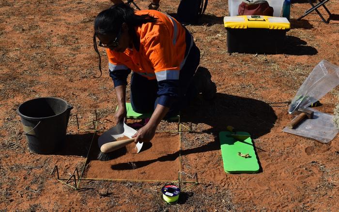 River Murray and Mallee Aboriginal Corporation member Melissa Johnson commencing the archaeological excavation at Sugarloaf Hill