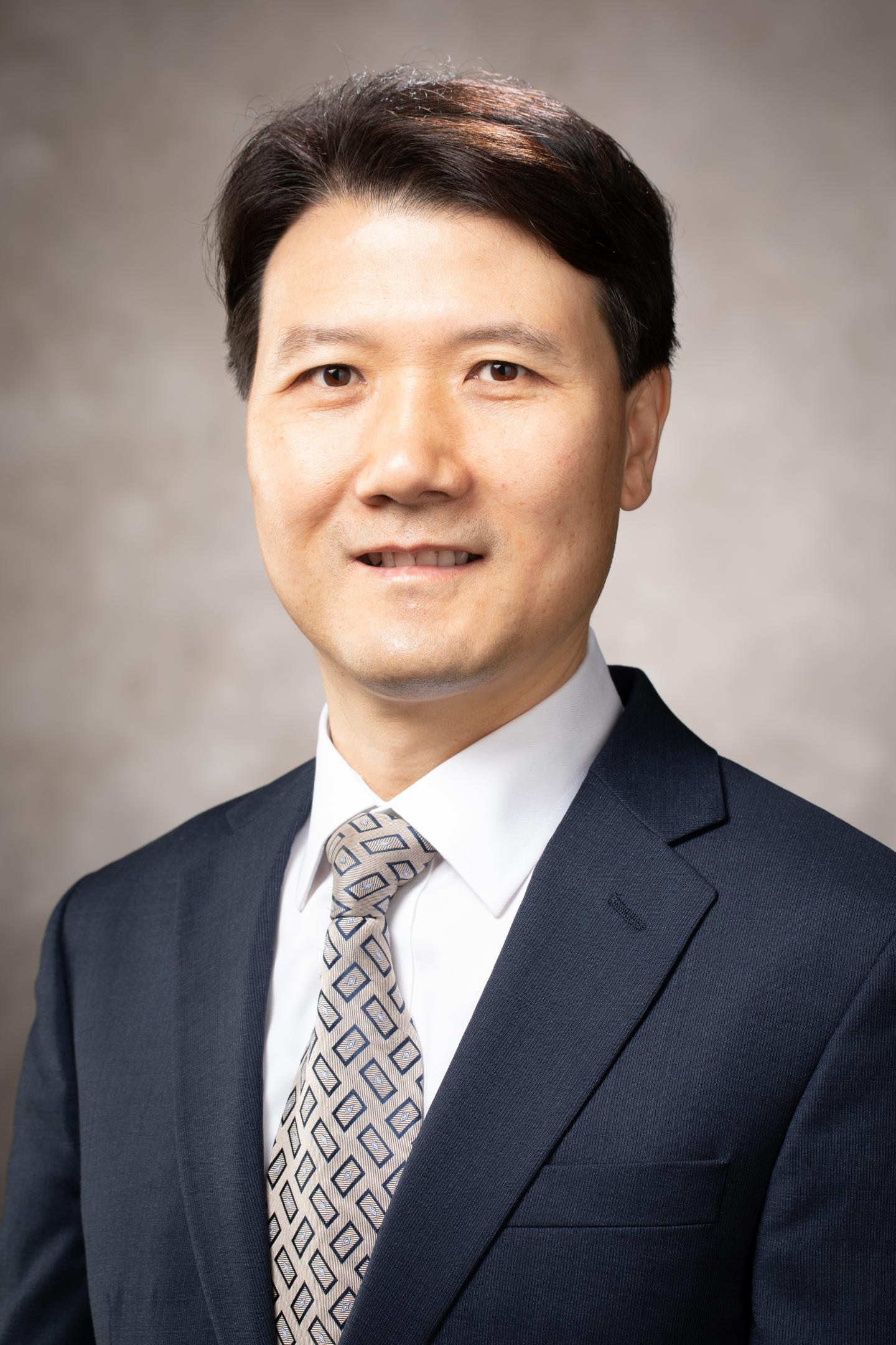 Justin Zhan University of Arkansas