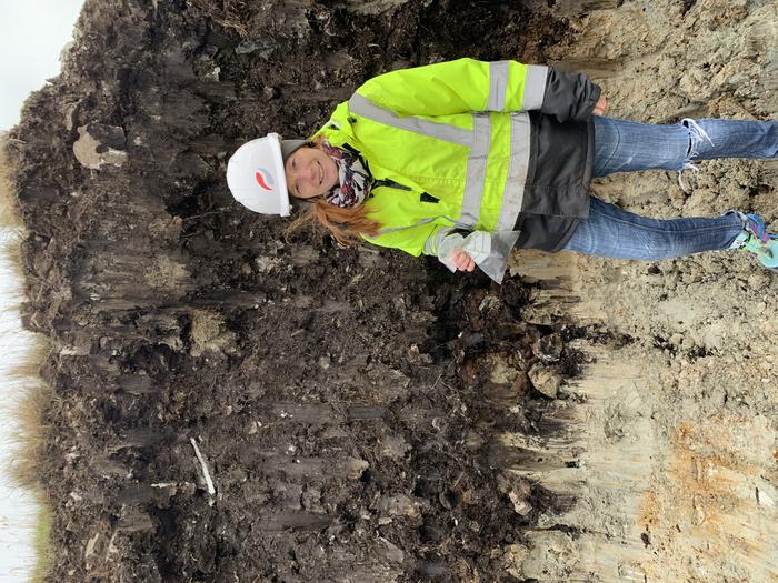Lead author Dr Zoë Thomas next to Falklands peat bog