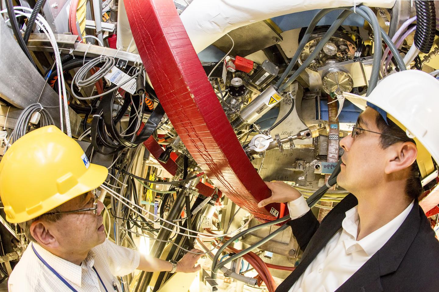 PPPL Physicists Robert Kaita and Michael Jaworski in Front of the National Spherical Torus Experimen