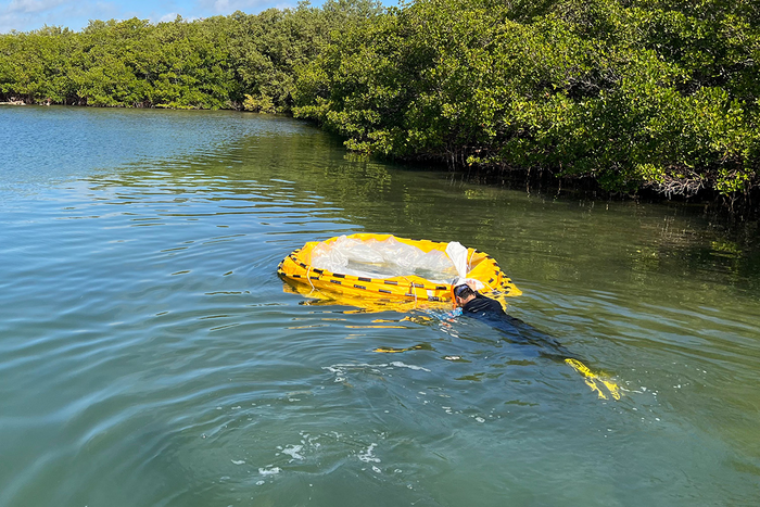 Limnocorral is installed in Sarasota Bay.