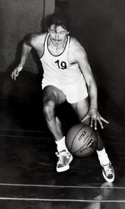 Siegfried Kasper in his youth as a point guard for an Austrian second division basketball team, wearing jersey #19.