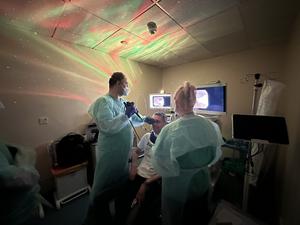 Professor Reza Nouraei performing an endoscopy on an awake patient using mindfulness techniques