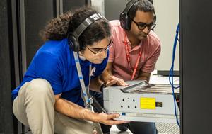 Students working on supercomputer