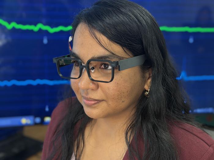 Researcher wears GlassTENG