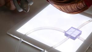 MagFlow navigates an artificial blood vessel. 2025 EPFL/Alain Herzog CC BY SA