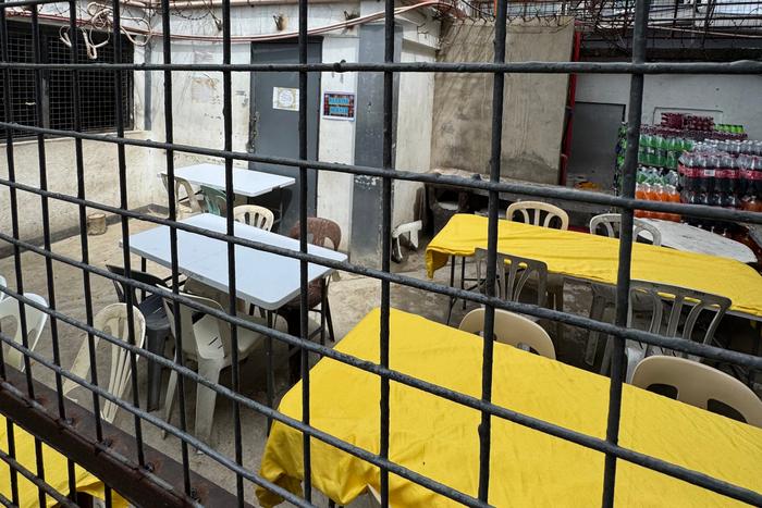 A makeshift dining area inside a Philippine jail