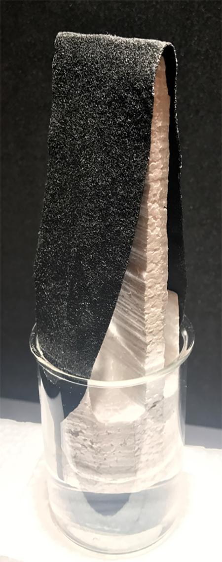 Carbon-Dipped Paper