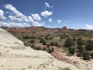 View across Ghost Ranch lands and Late Triassic rocks from the Hayden Quarries site
