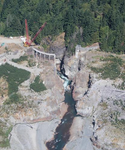 River Flowing through Remains of Dam