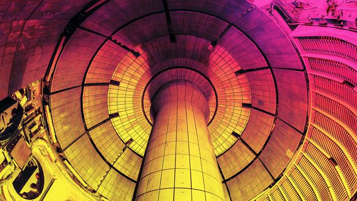 A colorized photograph of the inside of NSTX-U.