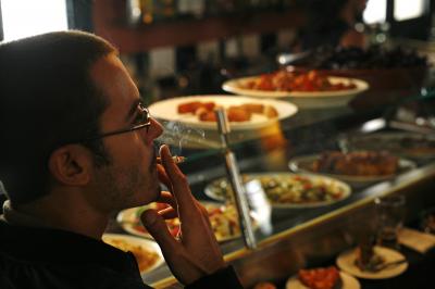 Is a Society with Smokers Profitable?