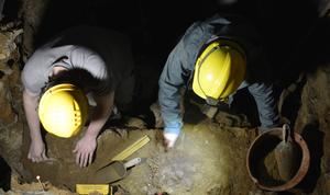 Scientists and students during excavations inside Trou Al'Wesse