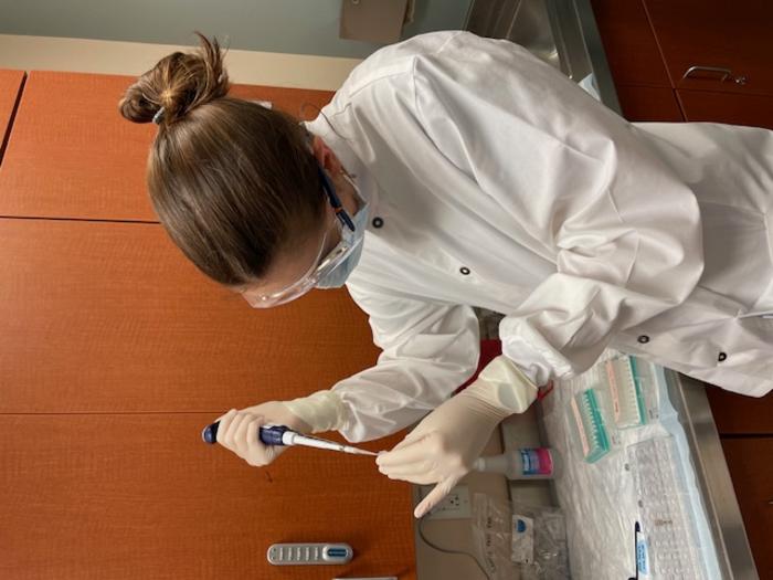 Emilie Newsham Novak working with the samples at The University of Texas MD Anderson Cancer Center.