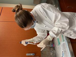 Emilie Newsham Novak working with the samples at The University of Texas MD Anderson Cancer Center.