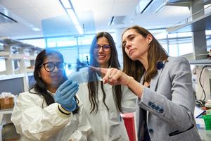 Far right: Wistar's Dr. Katherine Aird and lab