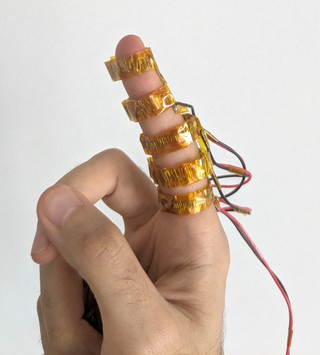 New wearable glove uses heat to help people feel their data