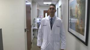 Dr. Pedram Gerami walking in Northwestern's dermapathology lab