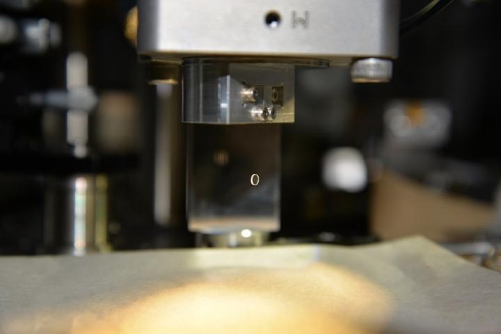Development of a Displacement Sensor to Measure Gravity of Smallest Source Mass Ever