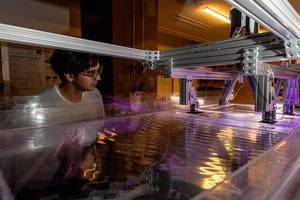 Shallow surface waves in a giant tank
