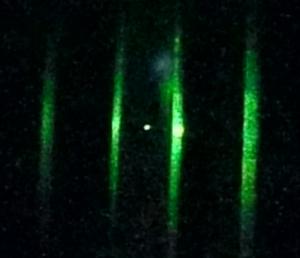 A single nanoparticle confined in a focused laser beam